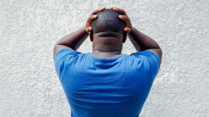 Black Men With Hands on Head